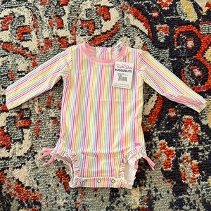 BNWT Ruffle Butts Rainbow stripe long sleeve one piece rash guard size 12-18m